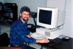 Carey with computer, 1980s